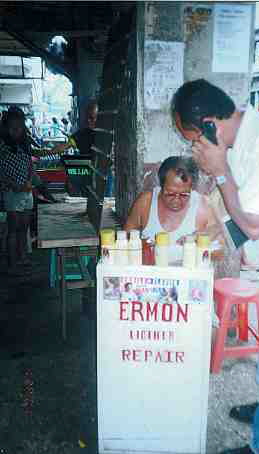 Cebu_SidewalkVendor_Lighter